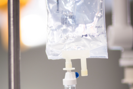 Soft IV fluid bag in a hospital setting.